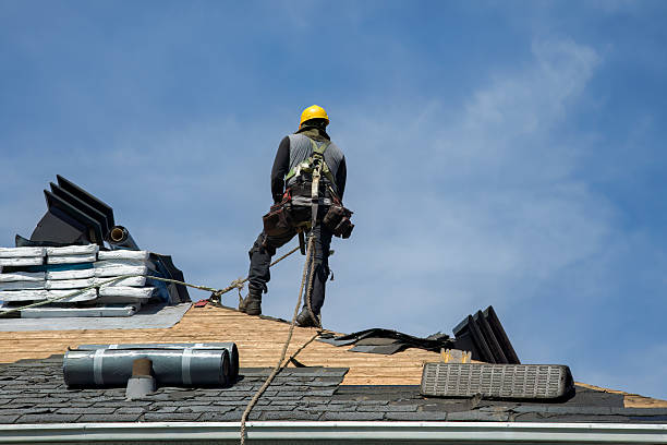 Professional Gutter Installation technician working in Baldwinville, MA